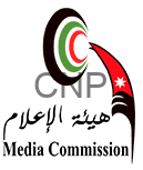 Logo with a green circular ring and red center/accents on a dark background, featuring a red swoosh and star element