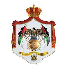 senaaa - Center News Network National coat of arms: crown atop a shield with banners, central emblem, and a decorative ribbon below.