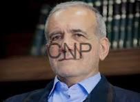 Portrait of a man in a blue shirt and dark blazer, seated indoors with a wooden bookshelf in the background (watermark 'CNP').