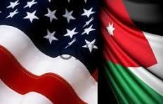 jo us - Center News Network Close-up of two national flags, the United States flag on the left and the Kenyan flag on the right, overlapping.