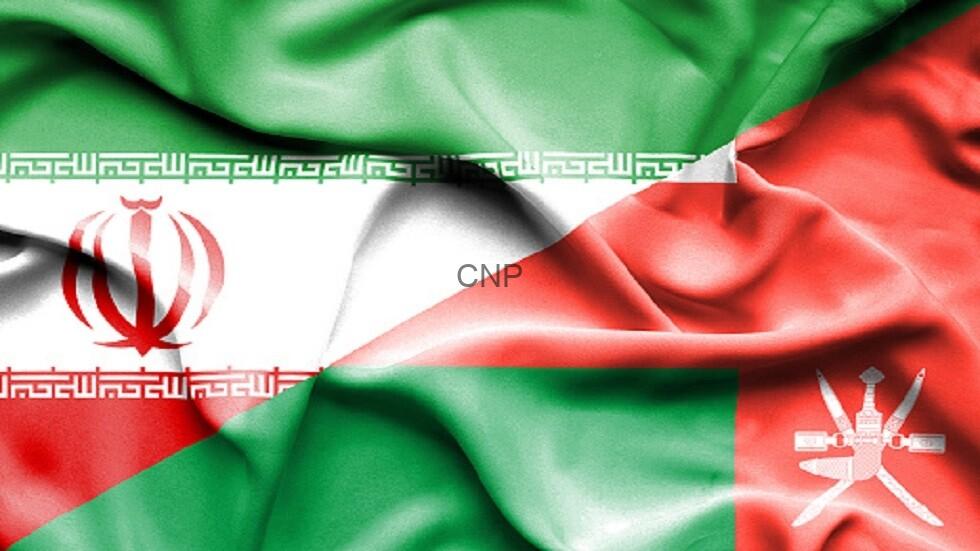 oma - Center News Network Wrinkled flags of Iran (left) and Oman (right) with 'CNP' text in the center to indicate a cross-country theme.