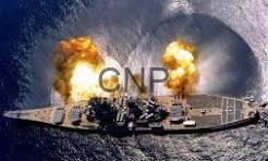 ship - Center News Network Warship on the water with two explosions and flames on its deck, producing smoke.