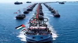 somod - Center News Network Flotilla of boats sailing in precise formation on a calm blue sea, lead ship flying an Indonesian flag.