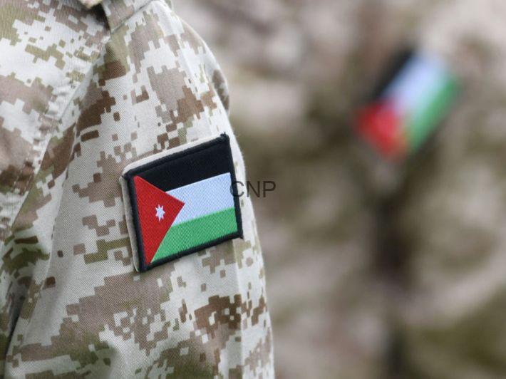 الجيش-الأردني-أهم-الحقائق-والمعلومات - Center News Network Close-up of a soldier's camouflage sleeve with a Jordan flag patch visible on the shoulder.