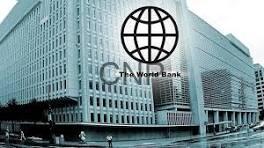 Exterior view of The World Bank headquarters with its globe logo overlay on the building’s facade.