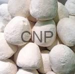 jameed - Center News Network Pile of pastel, round candies with a powdery coating, featuring a faint CNP watermark over the center.