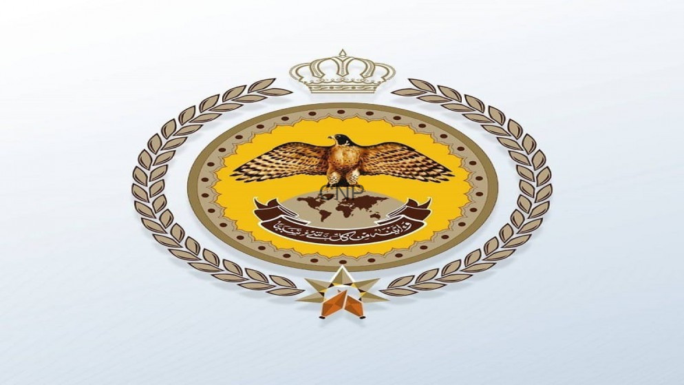 image - Center News Network Official emblem with an eagle perched over a globe/map motif, surrounded by a gold laurel wreath and crown, on a yellow circular background with a banner.